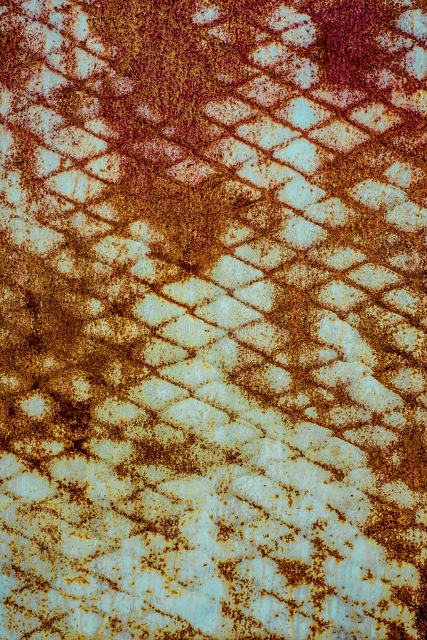 Struttura del primo piano di vecchio metallo arrugginito, dipinta nel bianco di cui è diventato arancio da struttura della ruggin fotografie stock Struttura del primo piano di vecchio metallo arrugginito, dipinta nel bianco di cui è diventato arancio da struttura della ruggin fotografie stock