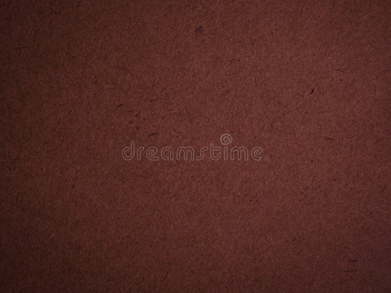 Struttura del primo piano rosso scuro del cartone, fondo di carta astratto immagini stock Struttura del primo piano rosso scuro del cartone, fondo di carta astratto immagini stock