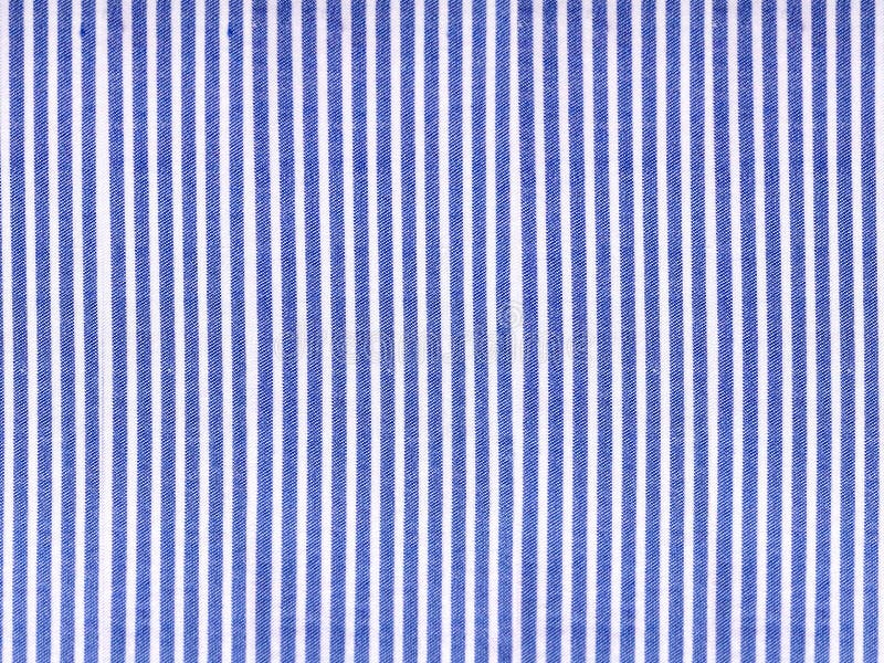 Struttura del tessuto di cotone del denim del modello barrato, fondo della tela immagini stock Struttura del tessuto di cotone del denim del modello barrato, fondo della tela immagini stock