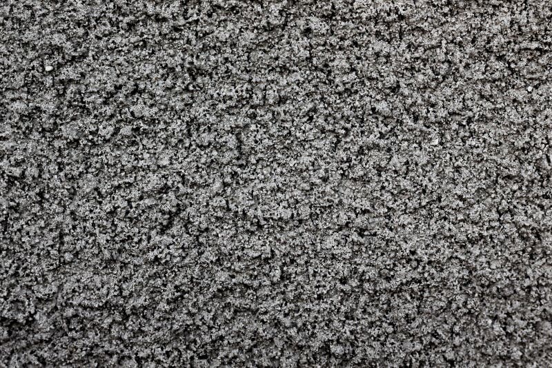 Struttura della parete con il plaster_ grigio grezzo del cemento fotografie stock Struttura della parete con il plaster_ grigio grezzo del cemento fotografie stock