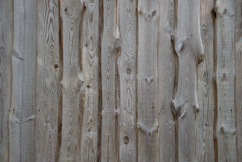 Struttura di legno del frammento della facciata della parete fotografia stock Struttura di legno del frammento della facciata della parete fotografia stock