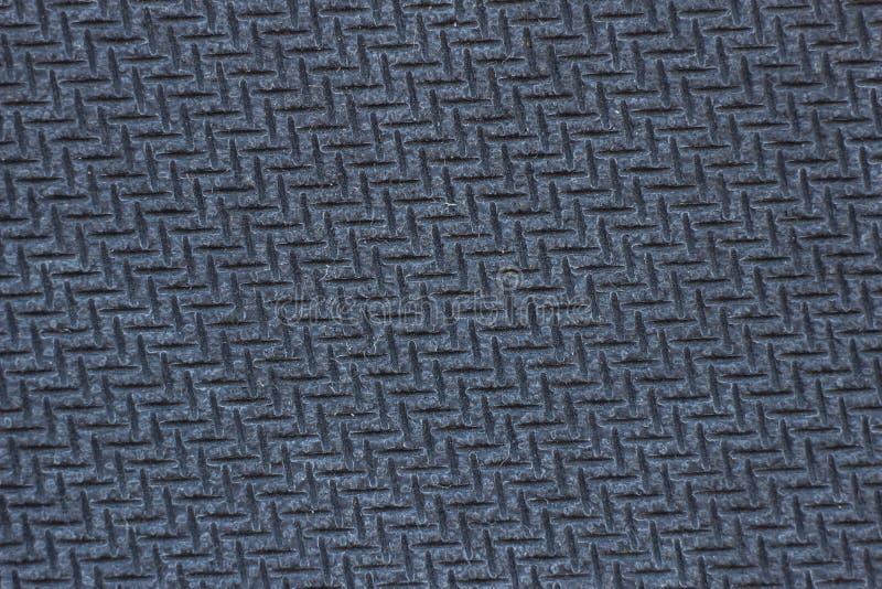 Struttura di un cuscinetto di topo di gomma strutturato del computer, macrofotografia, struttura di gomma nera, nera immagine stock Struttura di un cuscinetto di topo di gomma strutturato del computer, macrofotografia, struttura di gomma nera, nera immagine stock