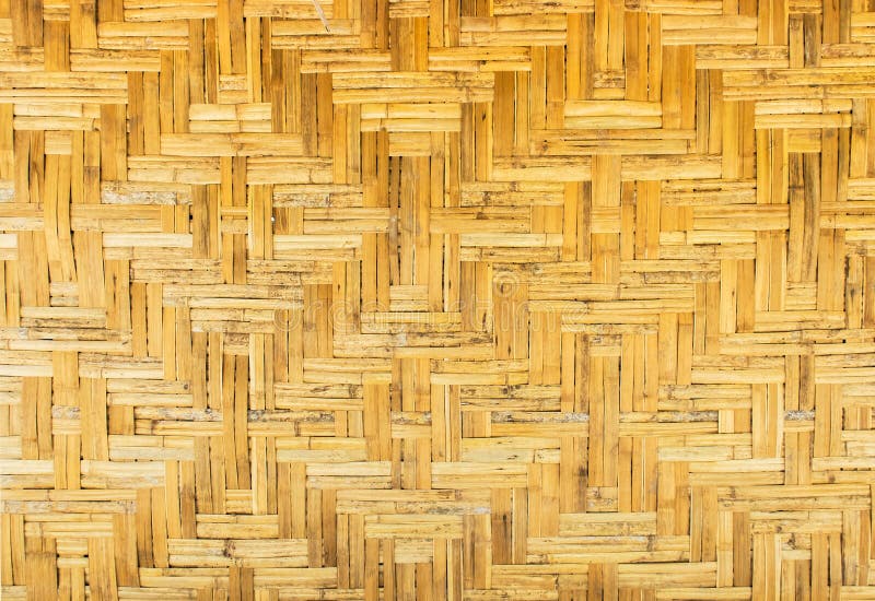 Struttura senza cuciture di legno del fondo del modello del rattan marrone chiaro fatto a mano tradizionale tailandese classico fotografia stock libera da diritti