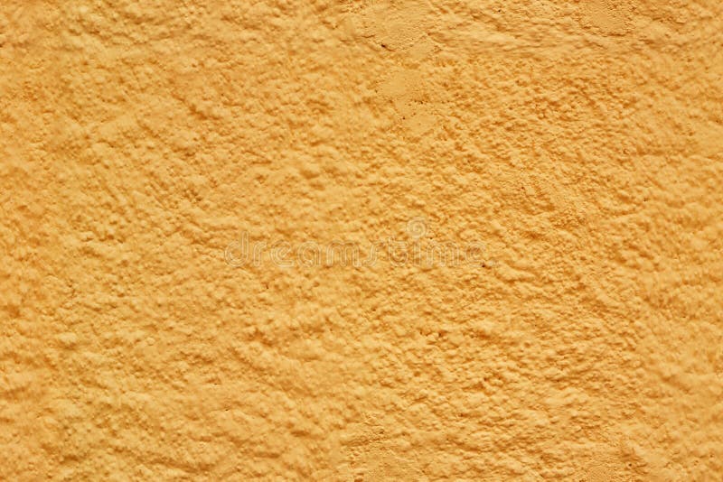 Struttura senza cuciture gialla dello stucco immagine stock Struttura senza cuciture gialla dello stucco immagine stock