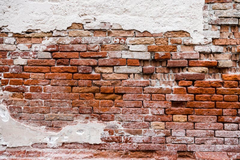 Brick old wall red loft texture with white stucco. Brick old wall red loft texture with white stucco.