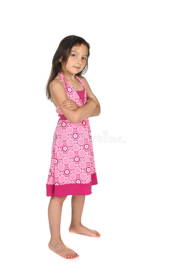 Stubborn looking girl standing with arms crossed