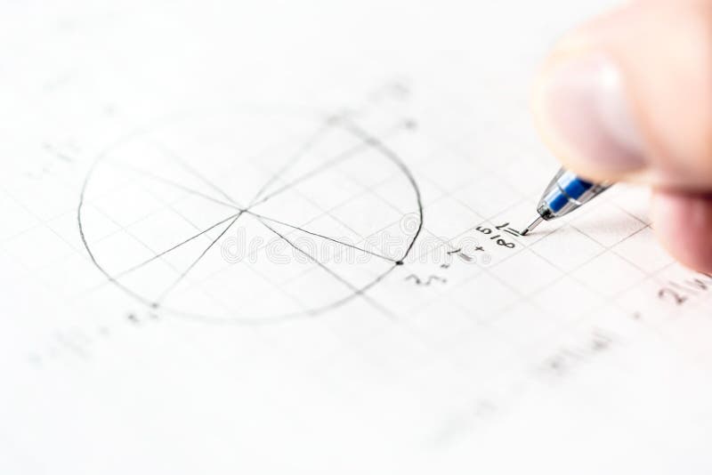 Student doing math homework or mathematics test in school class. stock image