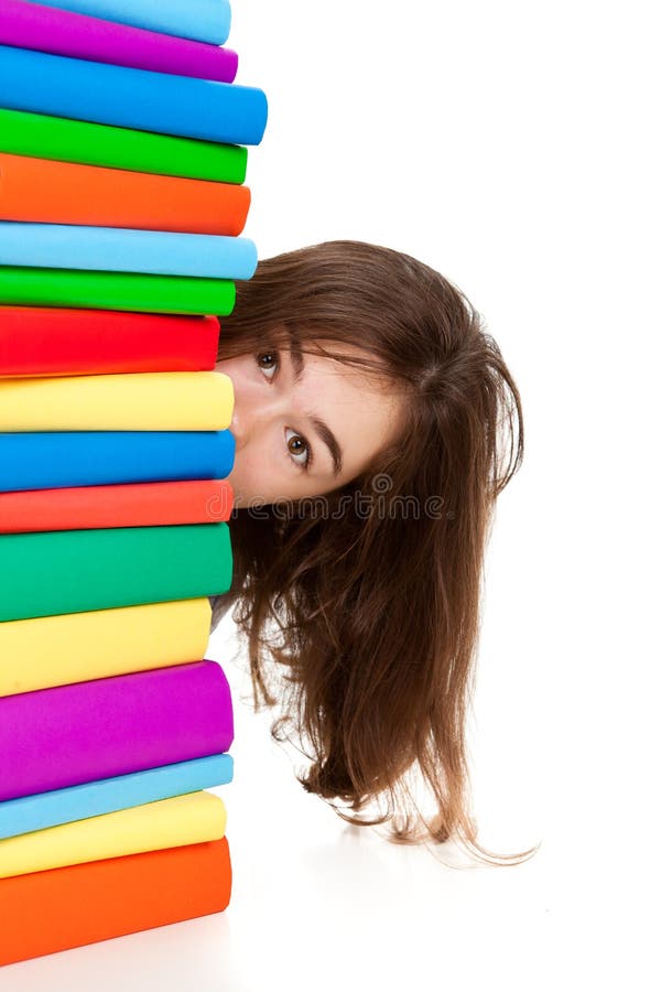 Student en stapel van boeken stock afbeeldingen Student en stapel van boeken stock afbeeldingen