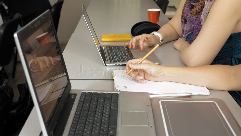 Student girls with their laptops computers