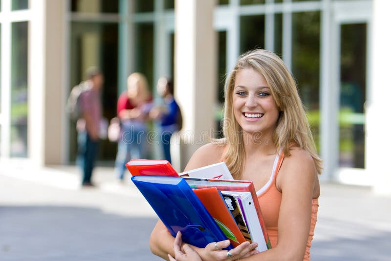 Student Holding Books