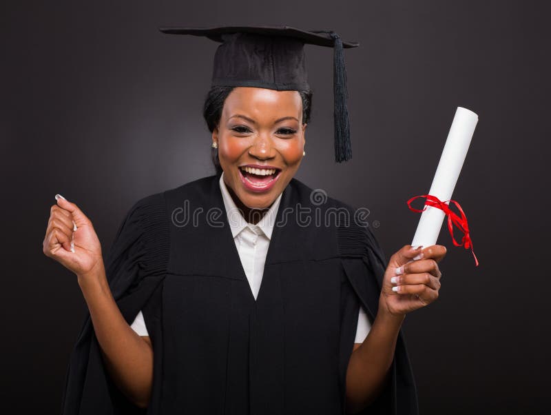 Student holding graduation certificate royalty free stock photography