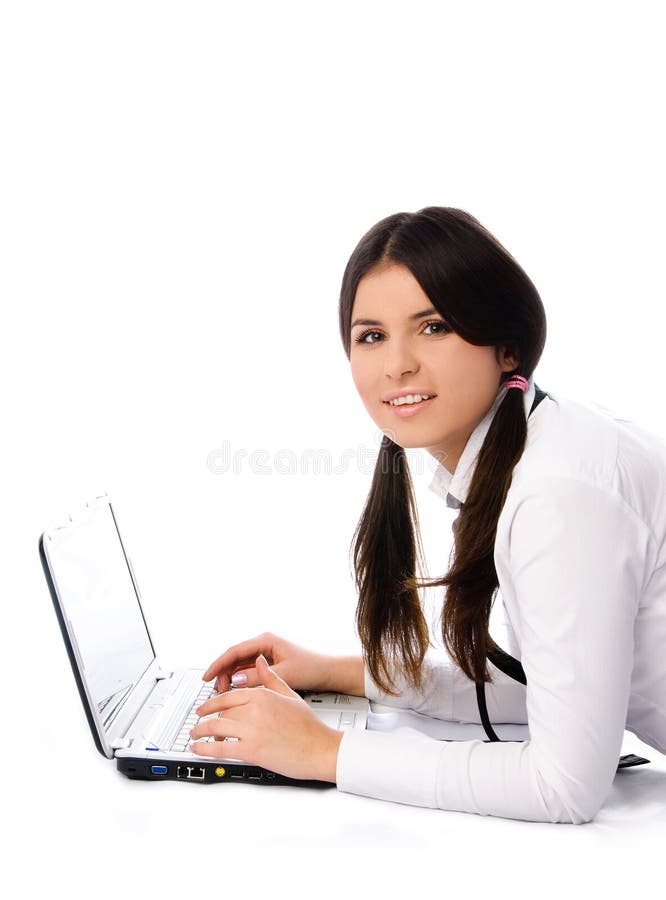 Student with a laptop on the floor