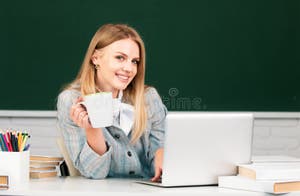 Student Preparing Exam Drinking Tea And Learning Lessons In School 