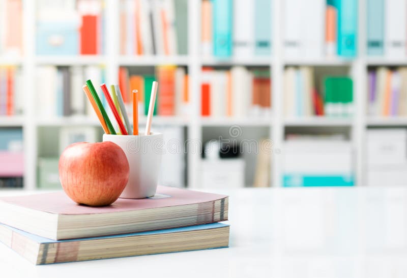 Student`s desk with books