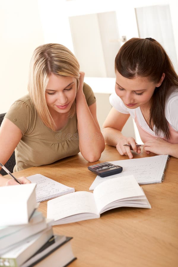 Student series - Two students writing stock image Student series - Two students writing stock image