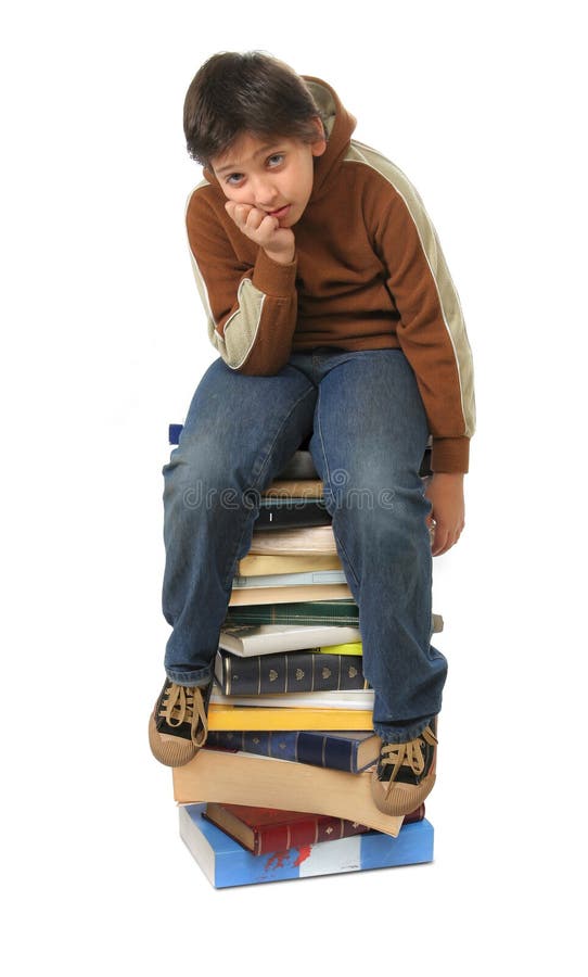 Student sitting on a pile of books. white background. Boring kid white stock images, royalty-free photos and pictures