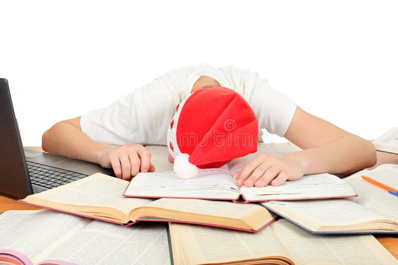 Student sleep in santa's hat stock photography