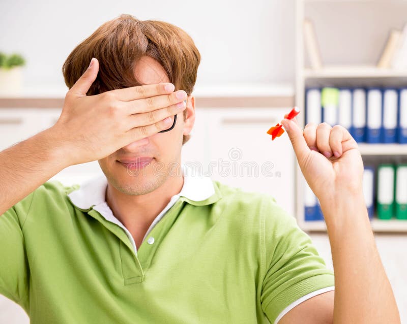 Blind Man Throwing Darts Stock Photos Free & RoyaltyFree Stock Photos from Dreamstime
