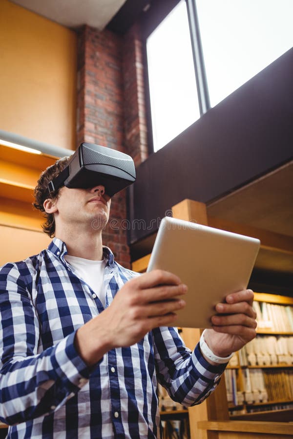 Student Using Digital Tablet and Virtual Reality Headset in Library Stock Image Image of