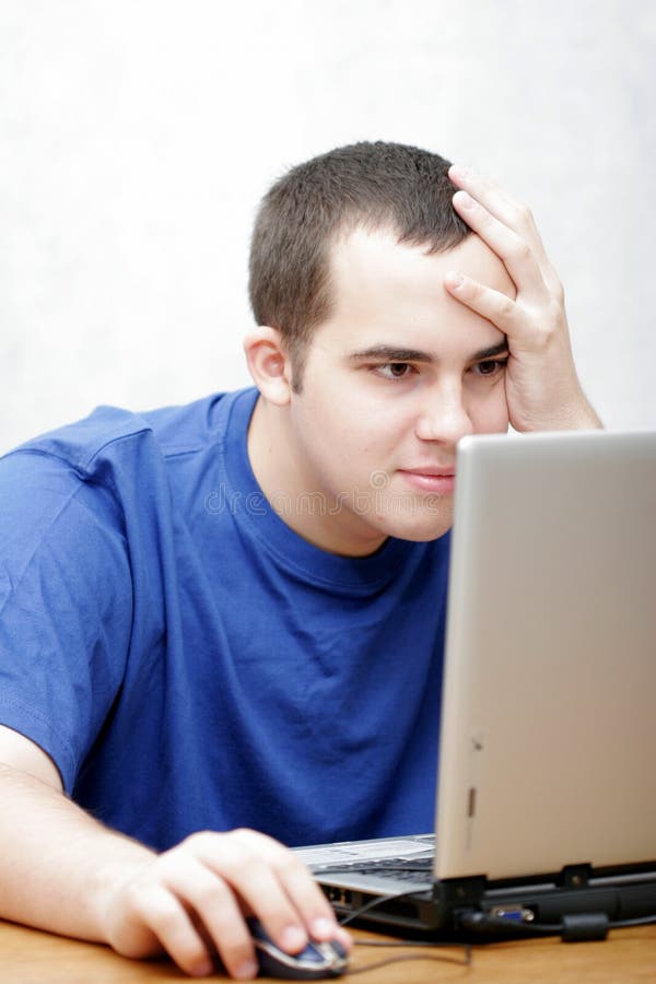 Student working on his laptop