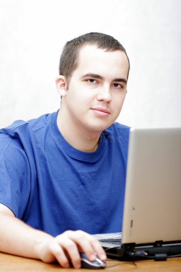 Student working on his laptop