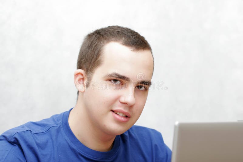 Student working on his laptop