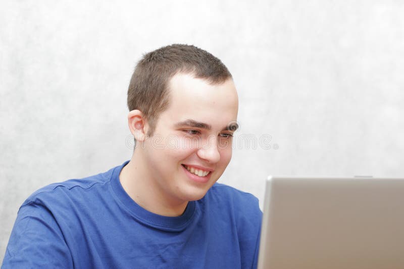 Student working on his laptop