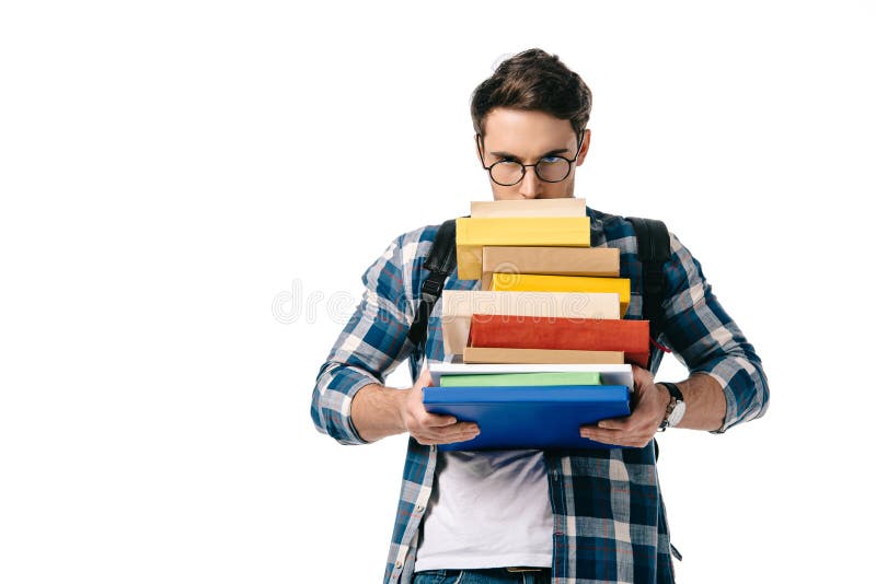 studente bello che guarda fuori dalla pila di libri fotografie stock studente bello che guarda fuori dalla pila di libri fotografie stock