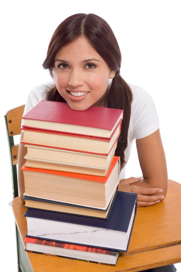 Studente di college ispanico amichevole con i libri fotografia stock libera da diritti Studente di college ispanico amichevole con i libri fotografia stock libera da diritti