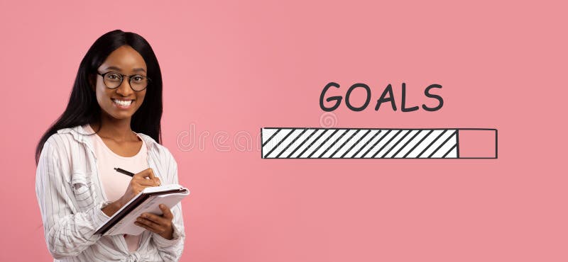 Smart black female student taking notes in copybook on pink studio background, collage with GOALS loading process bar. African American woman reaching her study targets. Panorama. Smart black female student taking notes in copybook on pink studio background, collage with GOALS loading process bar. African American woman reaching her study targets. Panorama