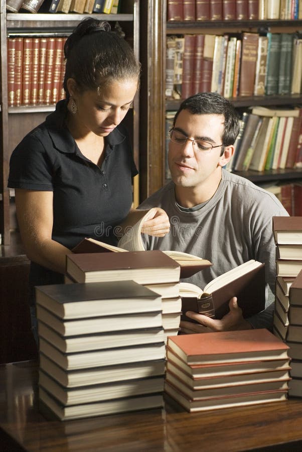 Students With Books - Vertical