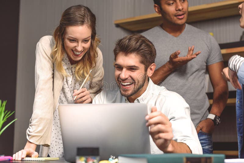 Students doing group project in campus library stock images