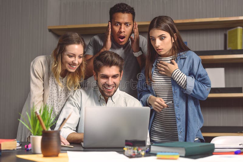 Students doing group project in campus library stock photography