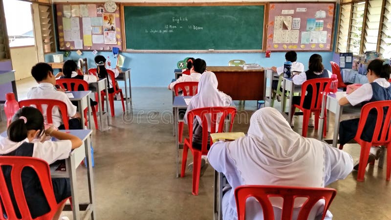 Students having exam in Malaysia stock image