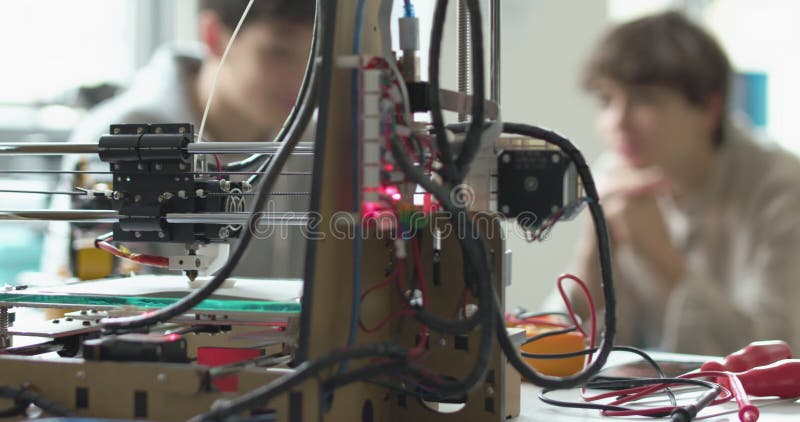 Students learning 3D printing in the lab stock video footage