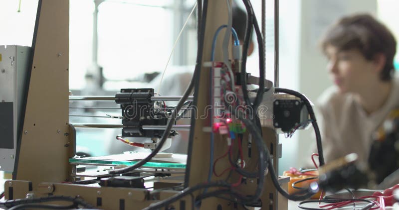 Students learning 3D printing in the lab stock footage