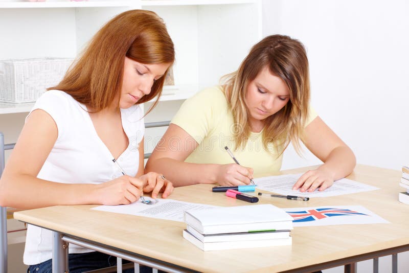 Students learning at desk