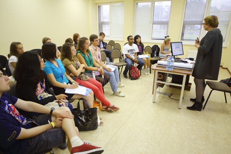 Students listen to lecturer at Global Youth Voice stock images
