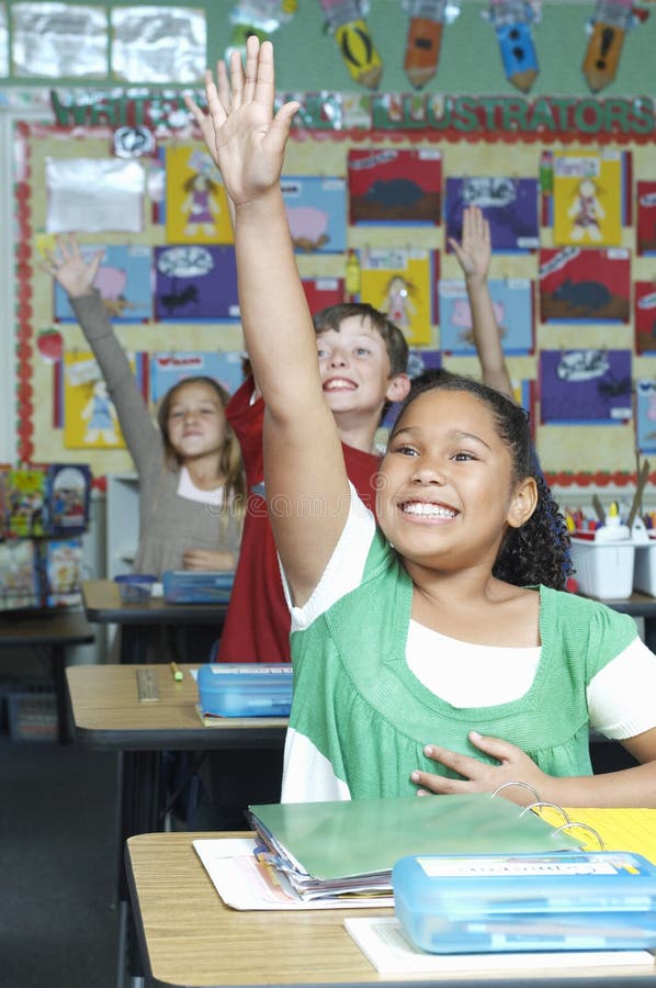 Students Raising Hands To Answer royalty free stock photography