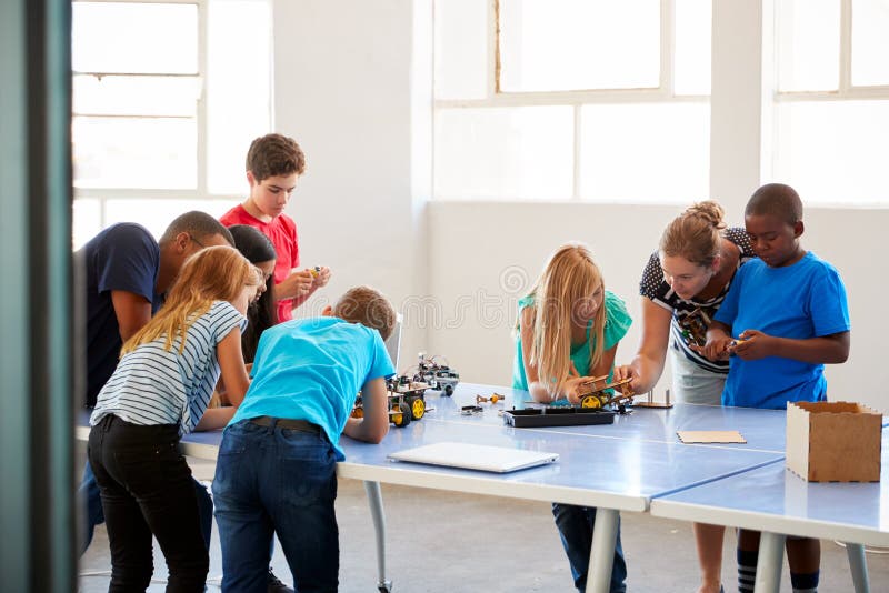 Two Male Students Building and Programing Robot Vehicle in after School ...