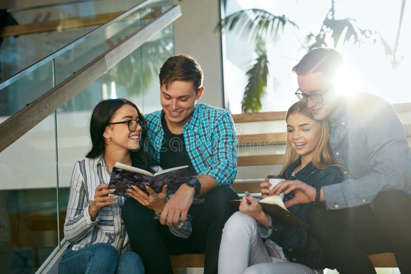 Students Studying, Reading Educational Information In College stock photos
