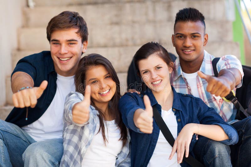 Students thumbs up stock photo