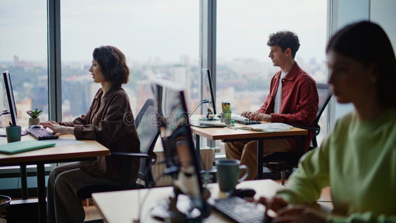 It students typing computers studying in modern panoramic college room closeup royalty free stock photo
