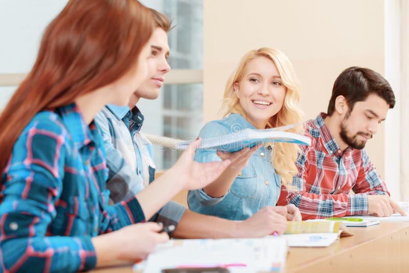 Students work with test-book royalty free stock photos