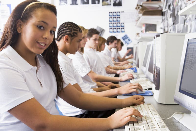 Row of schoolchildren studying in front of a computer. Row of schoolchildren studying in front of a computer