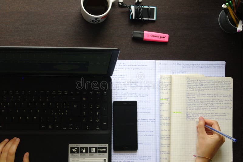 Studing and writig on a desk