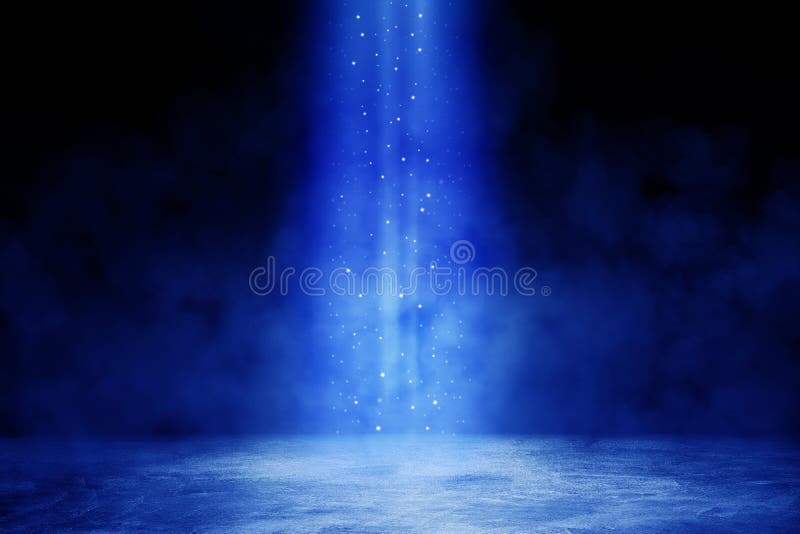 Studio dark room with blue lighting effect and fog or mist on concrete floor in black background.