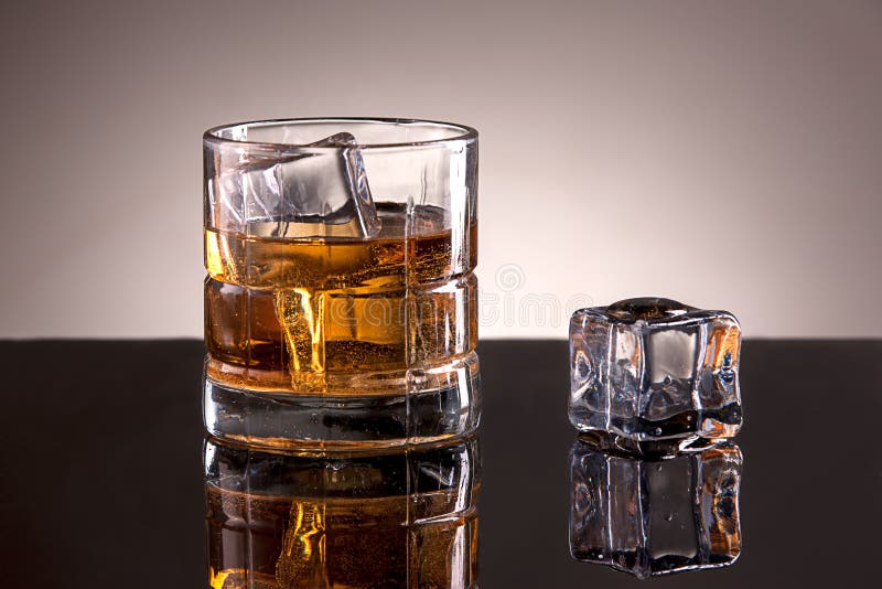 Studio Image of Liquor and Ice in a Glass. Stock Photo Image of taste