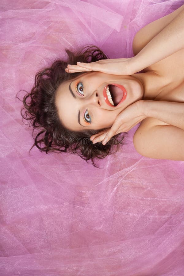 Studio portrait of beautiful girl with the emotion