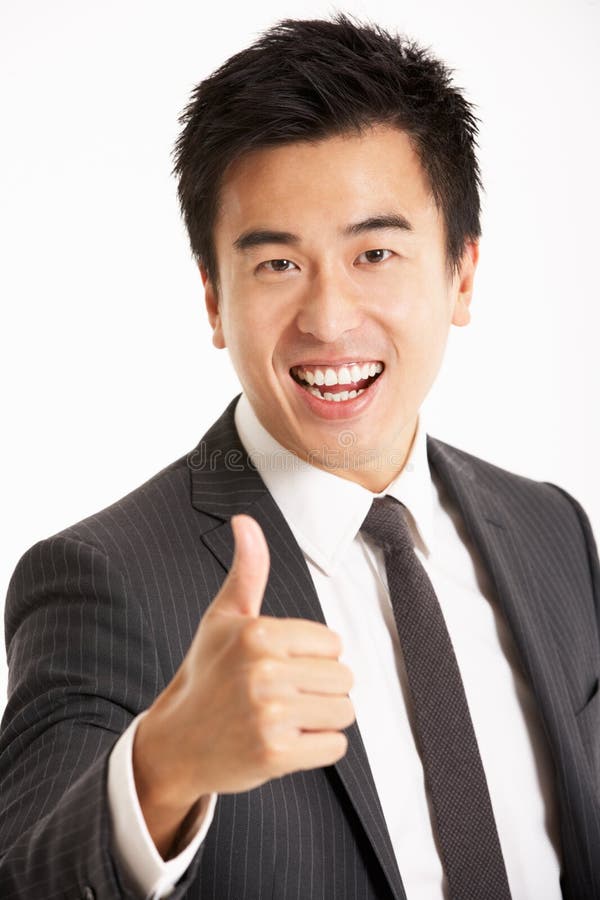 Studio Portrait Of Chinese Businessman